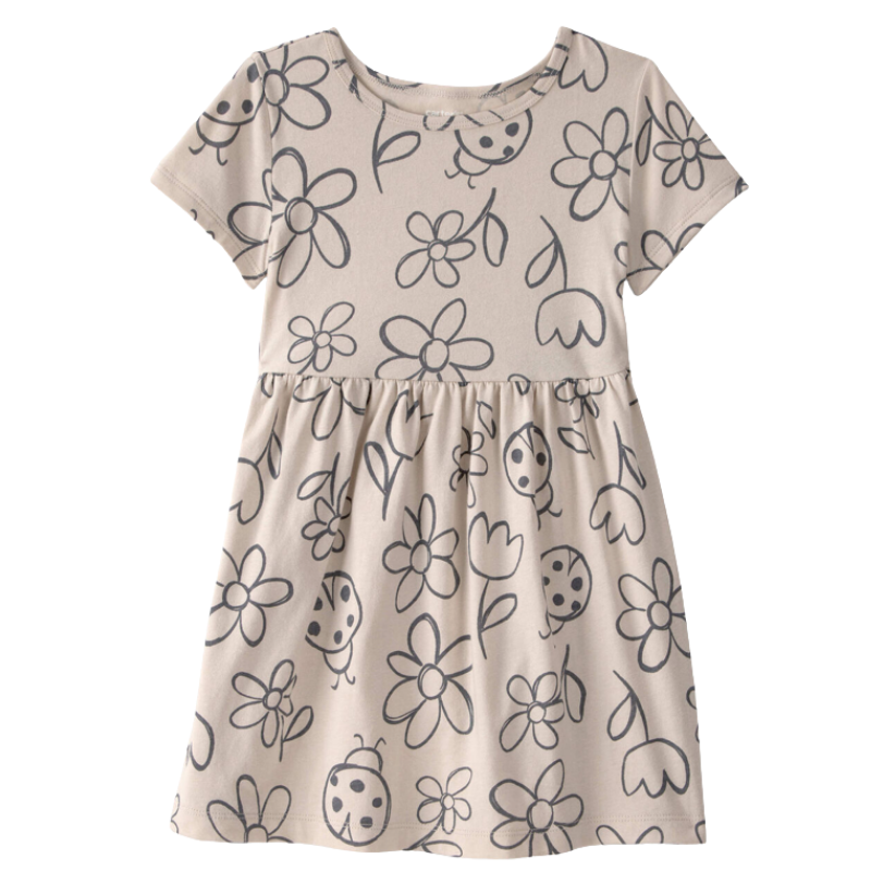Vestido beige de flores y mariquitas para niña